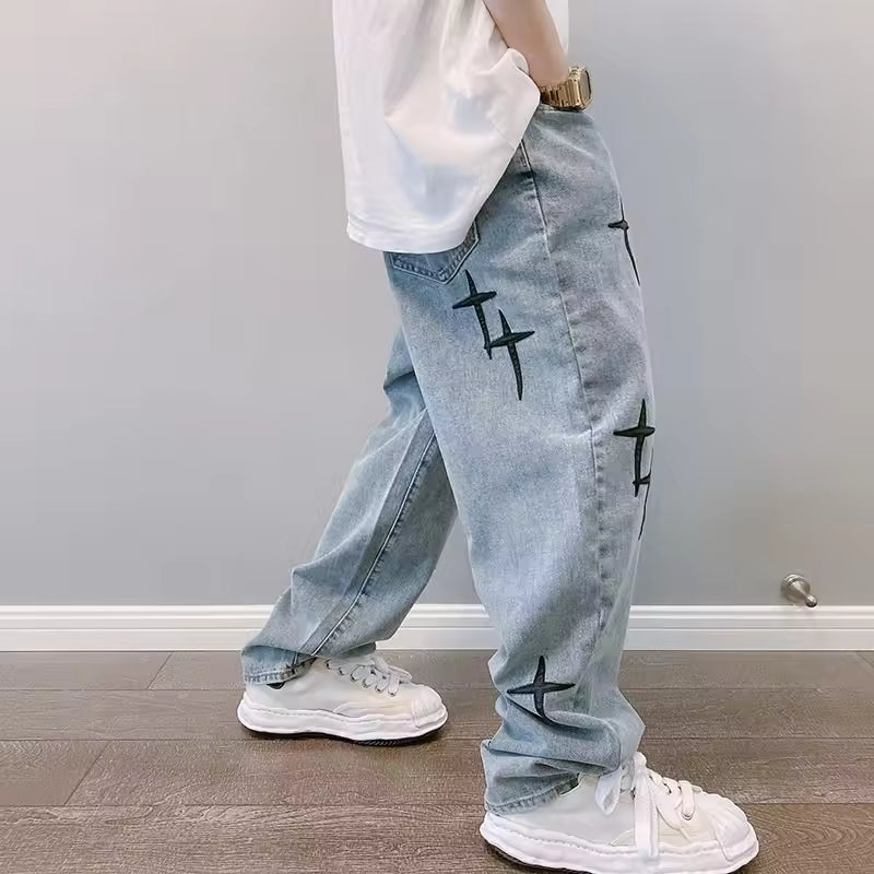 Washed Cross Design Baggy Jeans - Streetwear Boulevard