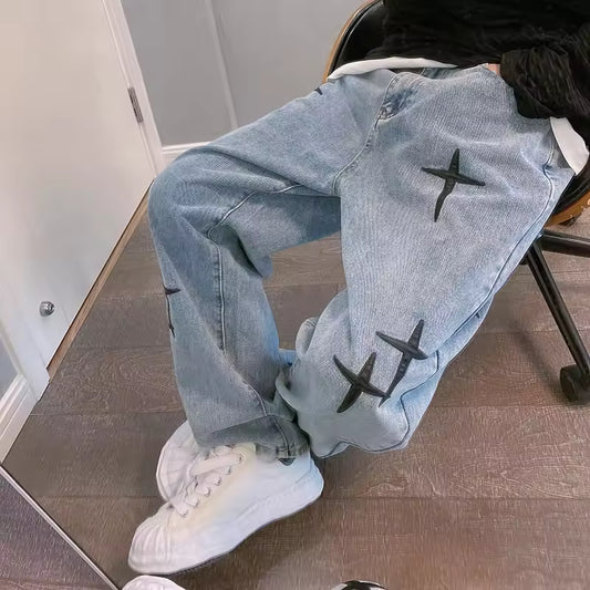 Washed Cross Design Baggy Jeans - Streetwear Boulevard
